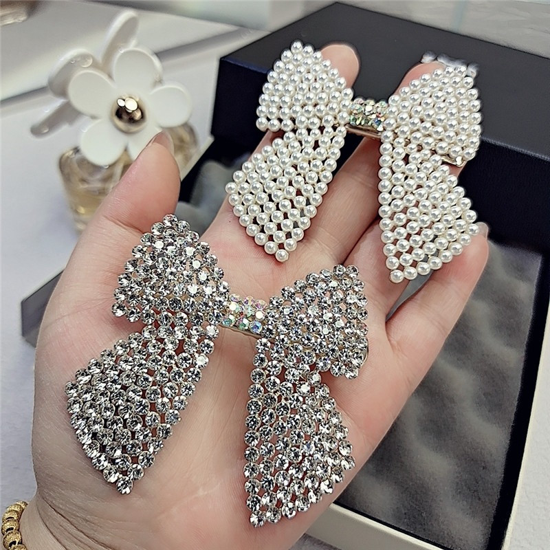 Rhinestone Pearl Bow Hair Clip - Body Jewelry Wholesale 评论和价格