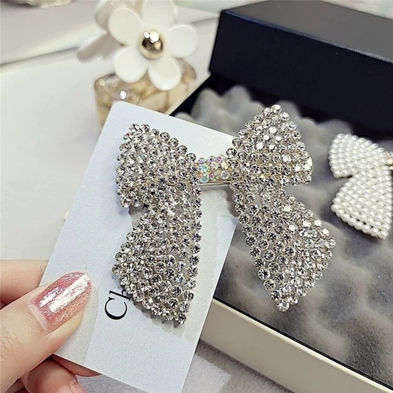 Rhinestone Pearl Bow Hair Clip - Body Jewelry Wholesale 评论和价格