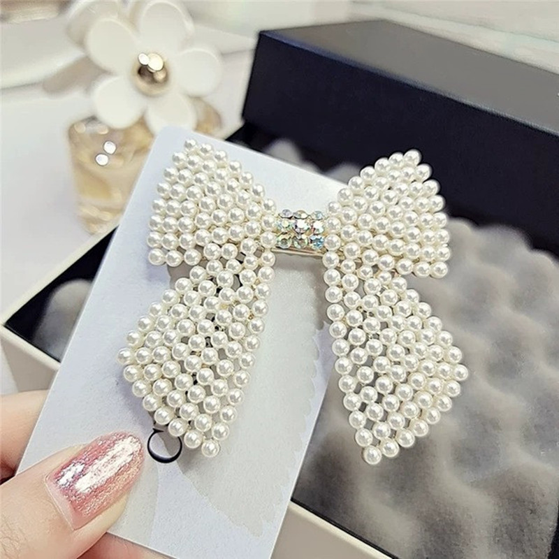 Rhinestone Pearl Bow Hair Clip - Body Jewelry Wholesale 评论和价格